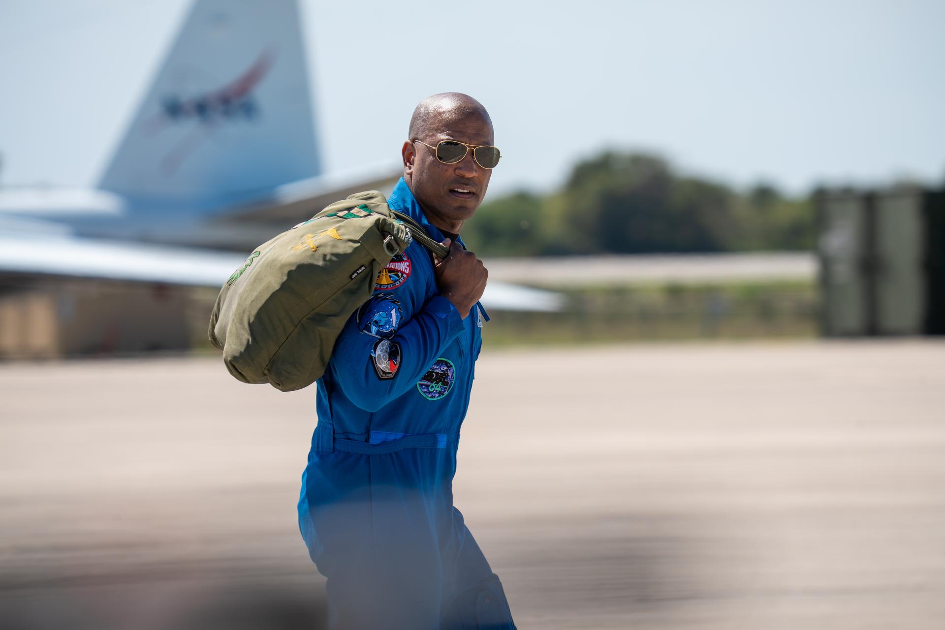 These images show the moments shortly after the arrival of the Artemis II crew to NASA’s Kennedy Space Center on March 27, 2026 ahead of the launch. The four astronauts, Victor Glover, Reid Wiseman, Christina Koch, and Jeremy Hansen, arrived on a T38, which can be seen behind them. They took turns speaking to the crowd as they also announced the zero-gravity indicator they would be taking with them on their journey.   